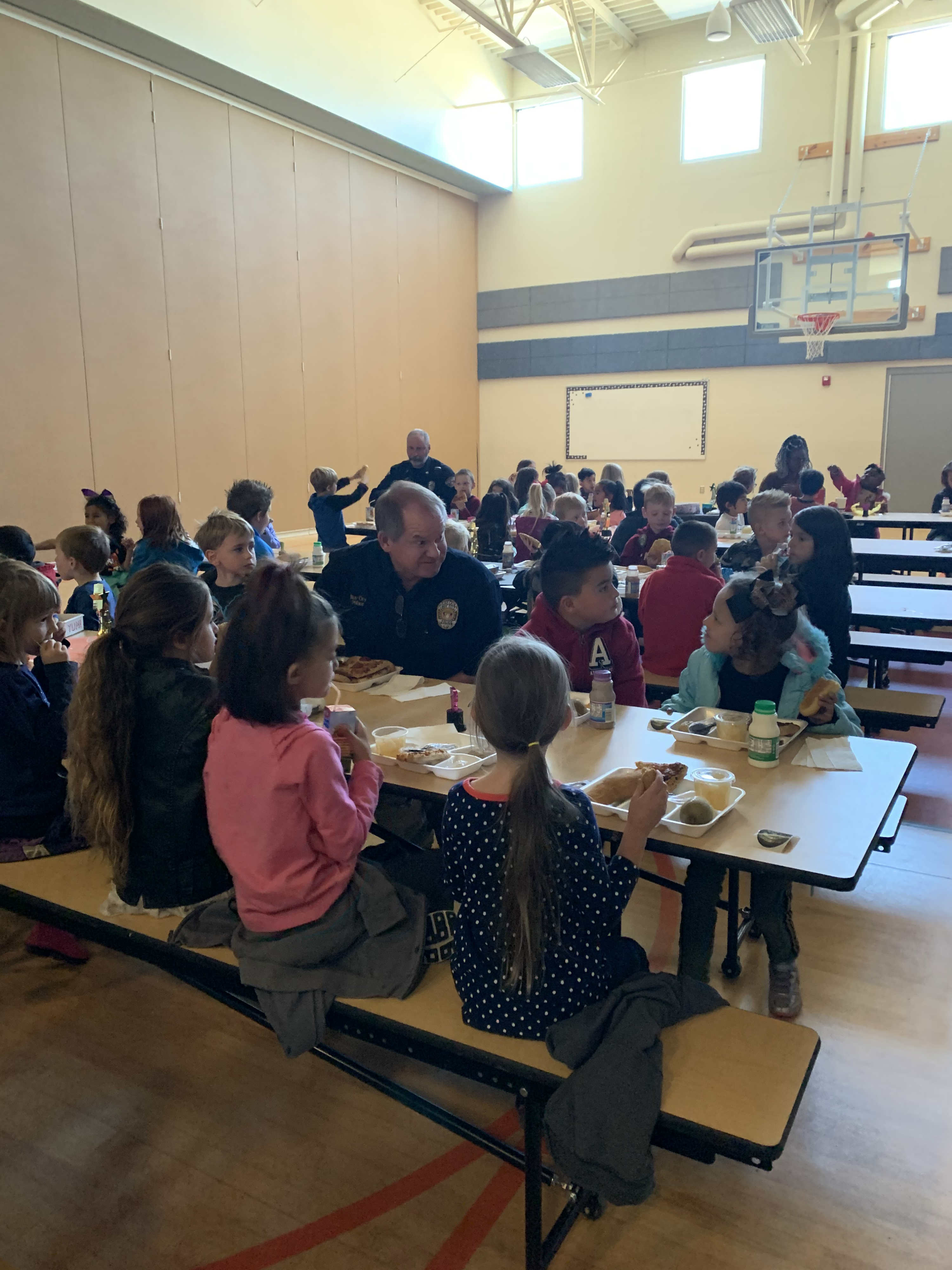 Kindergarteners with Roy City Police Department Eating Lunch